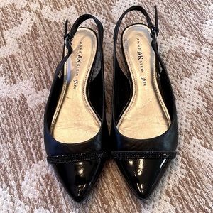 AK size 8 black patent and leather 1” sling back shoe, with sparkle strap at toe